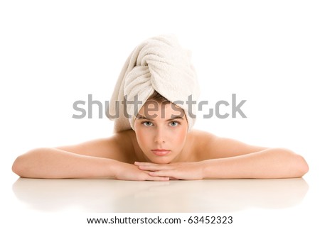 Portrait of beauty woman with head wrapped towel