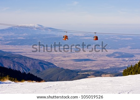 Cable car ski lift over mountain landscape. Rila mountains, ski resort Borovets, Bulgaria