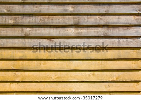 Plank background of old weathered wood of two color