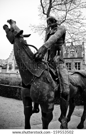 Four horsemen of the Apocalypse statue in black and white, Bruges, Belgium