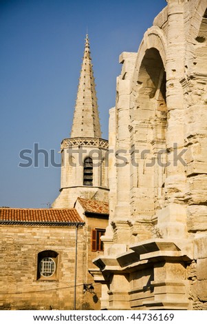 Historical Roman Arena and tower of church in Arles, Provence, France