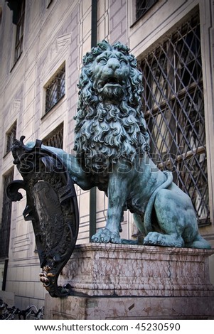 Stone statue of lion - ancient decoration in Munich residence, Germany