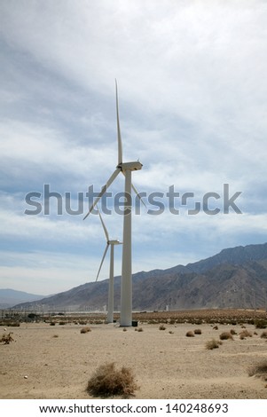 Wind Turbines at a Wind Farm in Southern California by Palm Springs produce Green Energy and help to power the homes and businesses of Palm Springs, Palm Desert, and surrounding cities.