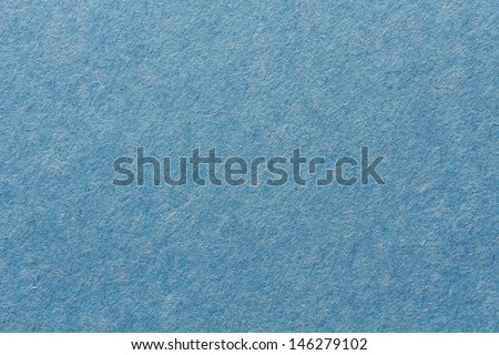 close up aka macro shot of blue construction paper, showing texture, paper fibers, flaws, and more. the perfect image for all your colored construction or recycled paper needs