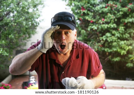 A Window Washer looks is shocked and surprised at what he sees going on Inside the house while he washes the windows on the outside. The perfect humorous window washer image for all your needs.