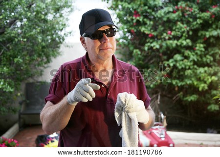 A Professional Window Cleaner uses a cloth towel to detail his freshly washed windows to make them Squeaky Clean. Professional Window Cleaners are in demand around the world. Window Cleaning is Fun!