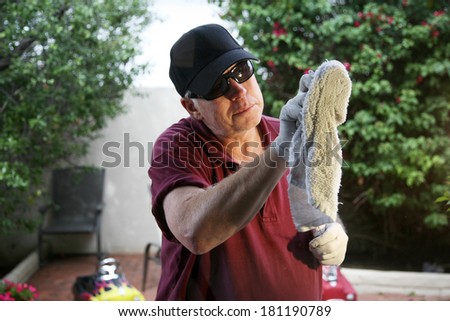 A Professional Window Cleaner uses a cloth towel to detail his freshly washed windows to make them Squeaky Clean. Professional Window Cleaners are in demand around the world. Window Cleaning is Fun!