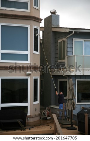 Window Washing with Deionized water and extension pole. For a Spot Free Wash and Rinse!