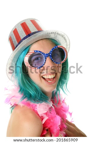 A Young Woman With Blue Hair gets ready for the Big 4th of July Celebration by wearing the colors of the US Flag. Red, White and Blue.