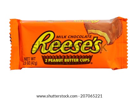 LAKE FOREST, CALIFORNIA - July 25, 2014: Reese\'s Peanut Butter Cup candy. Reese\'s was first introduced in 1928 and is now part of the Hershey Company.