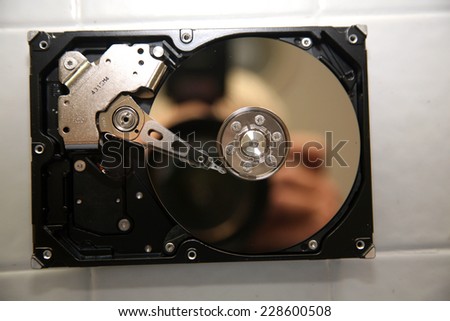 A unique view of a Genuine Computer Hard Drive. Computer Hard Drives are the Brains of any computer system. Without Hard Drives no computer would work or have any memory or be able to anything fun.