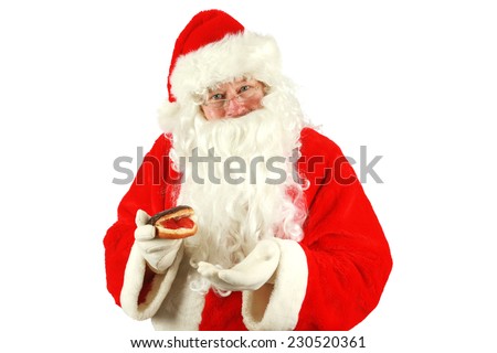 Santa Claus enjoys fresh baked piping hot donuts left for him as a thank you gift for all the nice presents he brings to good little boys and girls around the world. Santa loves donuts and stuff