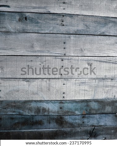 old de-nailed pine wood pallet boards placed side by side for a wooden abstract background or wallpaper. wood is used around the world for many things and is made from trees which grow in the forest