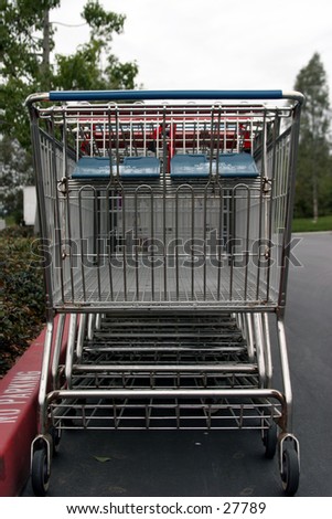 Shopping carts lined up in a parking lot