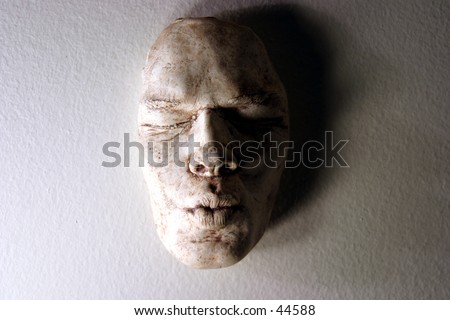 Life Mask, (aka Death Mask) made from a plaster mold of a persons face, then the mold is filled with clay in this case
