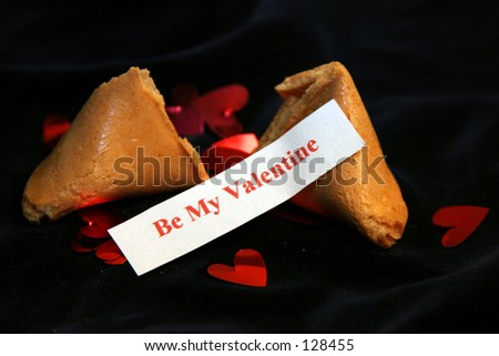 Be my Valentine Fortune cookie on blue velvet with metalic red hearts