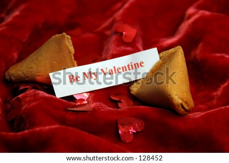 Be my Valentine Fortune cookie on red velvet with metalic red hearts