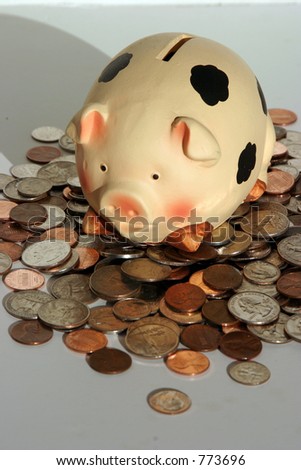 piggy bank on pile of change