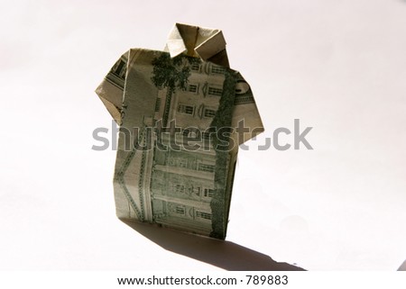 Origami folded money in the shape of a shirt