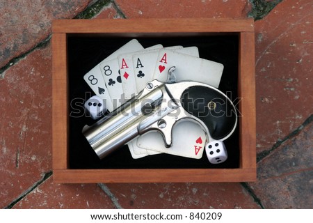 Circa 1889, Model 95, Type II Model 3 Double Derringer in its wooden display box on black velvet with aces and eights aka a 