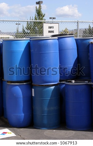 empty plastic drums for chemicals at a recycling location