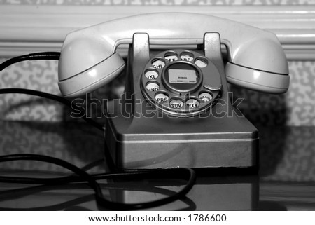 antique telephone in black and white