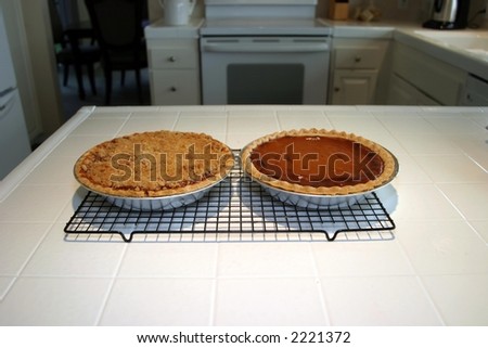 apple crumb pie and pumpkin pie fresh from the oven
