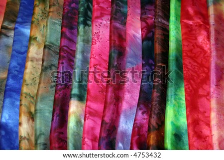 beautiful colors of hand died silk scarfs for sale in seattles world famous Pike Place Market aka Farmers Market