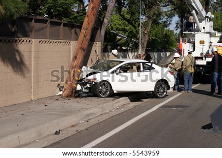 a car accident where the car sheers a 95 foot utility pole off at ground level and moves it 20 feet forward snapping it in two parts