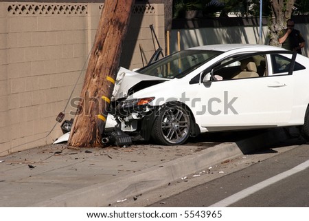 a car accident where the car sheers a 95 foot utility pole off at ground level and moves it 20 feet forward snapping it in two parts