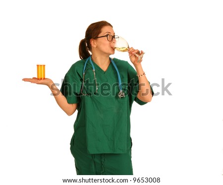 a nice nurse in green scrubs holds a 