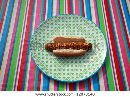 Hot Dogs with Words and Slogans written in Yellow Mustard \