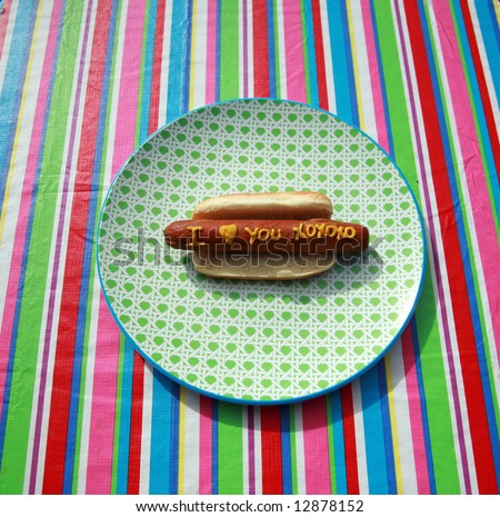 Hot Dogs with Words and Slogans written in Yellow Mustard 