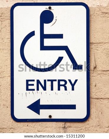 Handicap parking sign with arrow