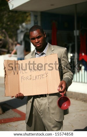 a thursty american male model stands on a city street with a cardboard sign that reads \