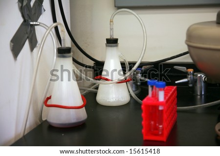 stock photo : a centrifuge with test tubes and other equipment in a science 