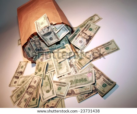 Money Flowing from a brown paper bag