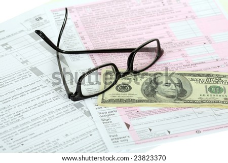 us tax forum with refund and glasses
