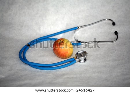 an apple with a stethoscope represents the saying \