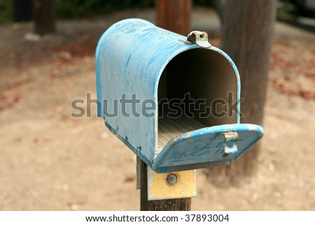 an old us postal mail box outdoors