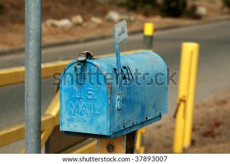 an old us postal mail box outdoors