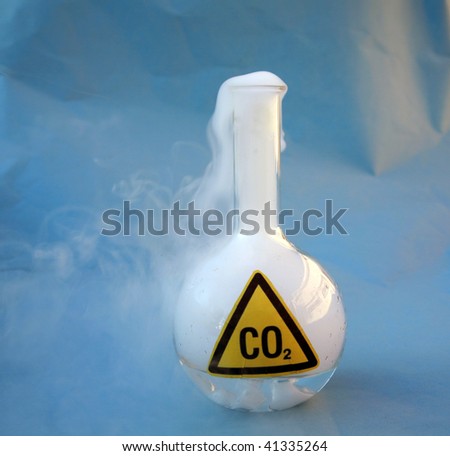 a 500ml flask filled with Carbon Dioxide aka CO2 releasing it into the atmosphere over a blue background