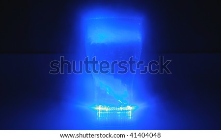 Black And Neon Blue. a neon blue glowing drink