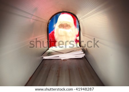 Santa Claus gets his mail from his mail box in the north pole before christmas eve