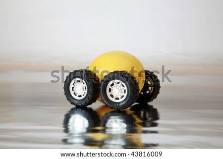 generic truck wheels on a yellow lemon represents the catch phrase 