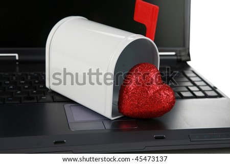 a laptop computer with a mail box isolated on white with  Valentines Day Hearts represents \