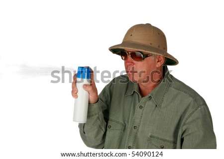a man in a pith Helmet sprays air freshener isolated on white with room for your text or images