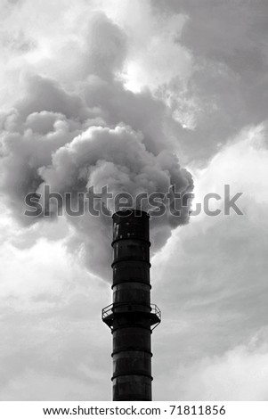 an industrial smoke stack belches out noxis smoke and crud including dreaded CO2 and other global warming gasses freely into the automosphere quickly ruining our earth and enviroment for all