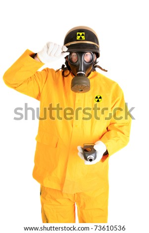 stock-photo-a-nuclear-safety-inspector-wears-his-quot-anti-radiatio-n-quot-suit-gas-mask-police-helmet-and-73610536.jpg