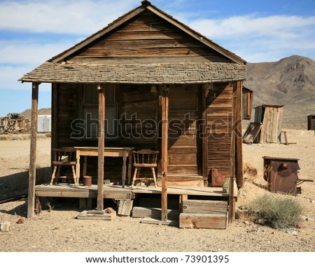 an old gold miners shack in a real ghost town from the 1800\'s in the wild west of california or nevada